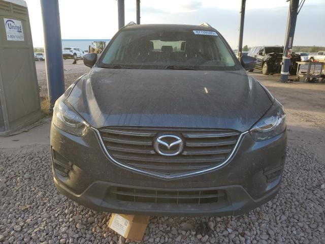 Photo 5 from auction – 2016 MAZDA CX-5 GT with VIN JM3KE2DY9G0640425