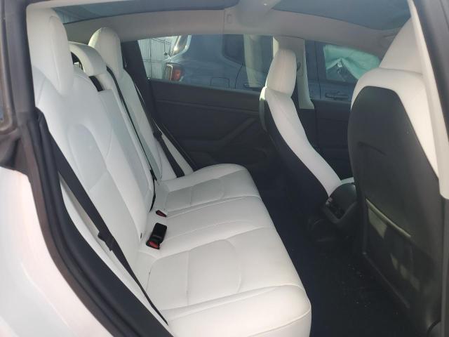 Снимка 10 от търг – 2023 TESLA MODEL 3 с VIN 5YJ3E1EC6PF494092