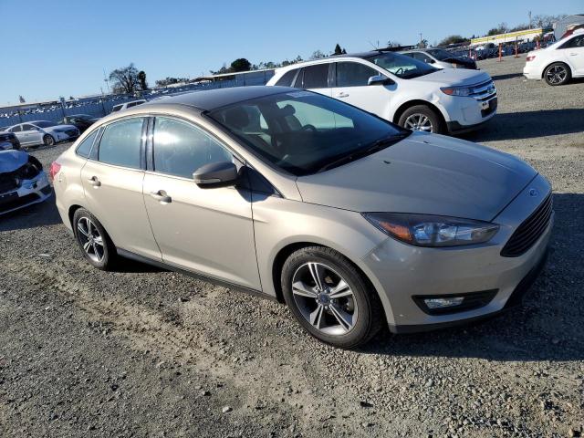 Photo 4 from auction – 2016 FORD FOCUS SE with VIN 1FADP3FE8GL301759
