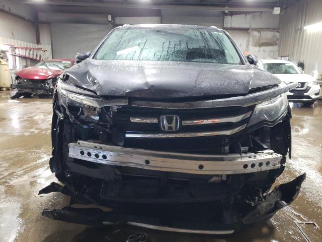 Photo 5 from auction – 2017 HONDA PILOT ELIT with VIN 5FNYF6H06HB099171