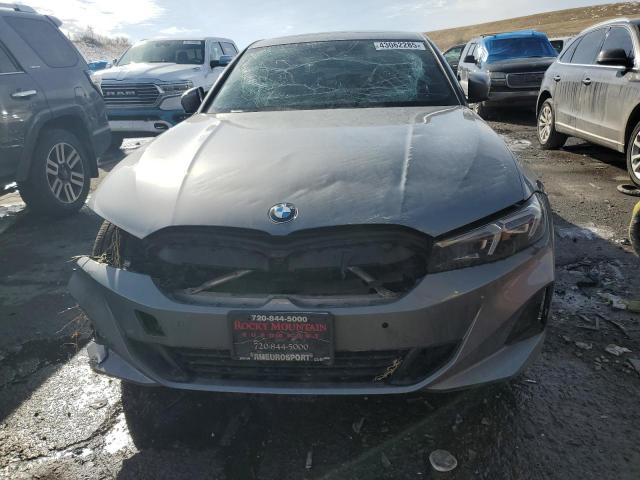 Photo 5 from auction – 2023 BMW 330XI with VIN 3MW89FF0XP8D75507