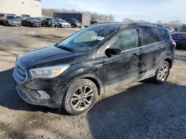 FORD ESCAPE SE 2017 with VIN 1FMCU0GD4HUC31090 - Photo from auction