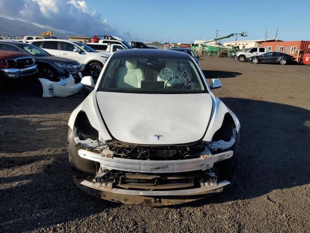 Photo 5 from auction – 2021 TESLA MODEL 3 with VIN 5YJ3E1EA4MF048663