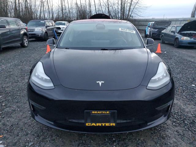 Снимка 5 от търг – 2018 TESLA MODEL 3 с VIN 5YJ3E1EA0JF003893