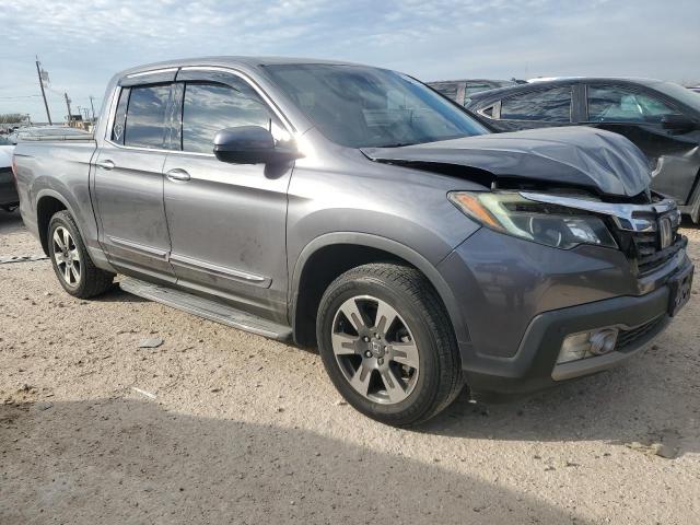 Photo 4 from auction – 2017 HONDA RIDGELINE with VIN 5FPYK3F79HB022036