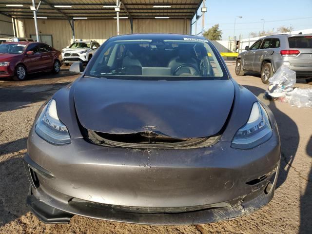 Photo 5 from auction – 2018 TESLA MODEL 3 with VIN 5YJ3E1EA2JF020985