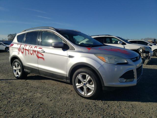 Photo 4 from auction – 2014 FORD ESCAPE SE with VIN 1FMCU9G92EUD01892