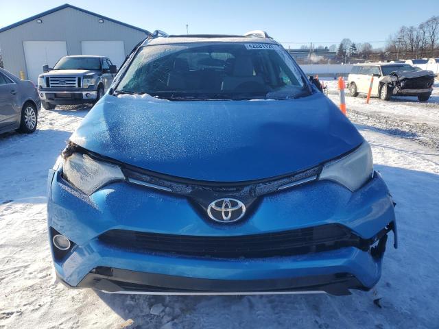 Photo 5 from auction – 2016 TOYOTA RAV4 XLE with VIN JTMRFREV1GJ064907