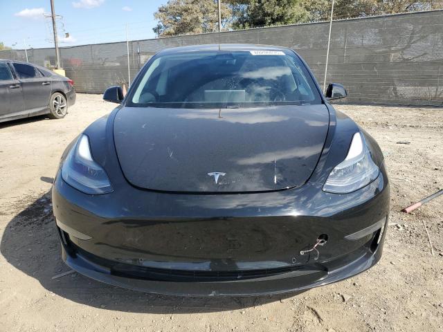 Photo 5 from auction – 2021 TESLA MODEL 3 with VIN 5YJ3E1EA7MF029217