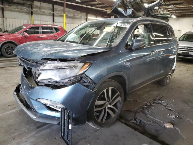 HONDA PILOT TOUR 2016 with VIN 5FNYF6H96GB071478 - Photo from auction