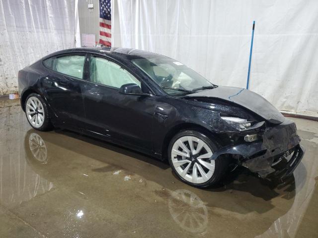 Photo 4 from auction – 2022 TESLA MODEL 3 with VIN 5YJ3E1EB7NF191634