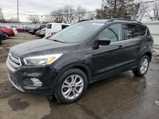 FORD ESCAPE SE 2018 with VIN 1FMCU0GD8JUA96122 - Photo from auction