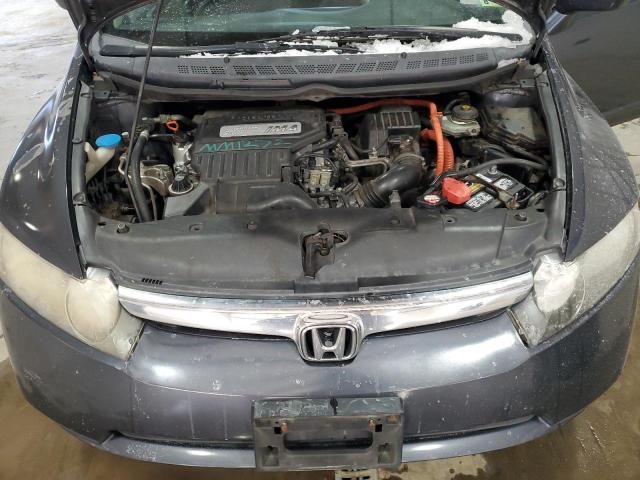 Photo 11 from auction – 2007 HONDA CIVIC HYBR with VIN JHMFA36237S007300