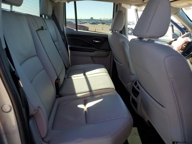 Photo 10 from auction – 2017 HONDA RIDGELINE with VIN 5FPYK2F63HB008277