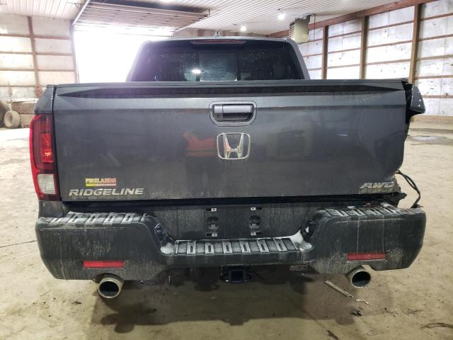Photo 6 from auction – 2023 HONDA RIDGELINE with VIN 5FPYK3F57PB064699