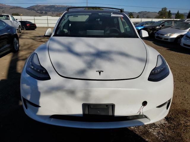 Снимка 5 от търг – 2022 TESLA MODEL Y с VIN 7SAYGAEE9NF378936