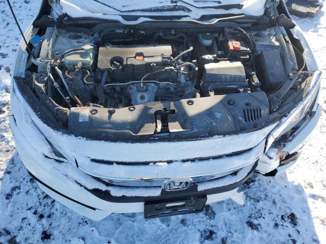 Photo 11 from auction – 2018 HONDA CIVIC LX with VIN 2HGFC2F50JH604243