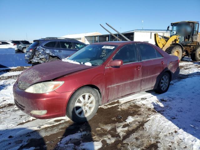 TOYOTA CAMRY LE 2004 with VIN 4T1BF32K94U069822 - Photo from auction