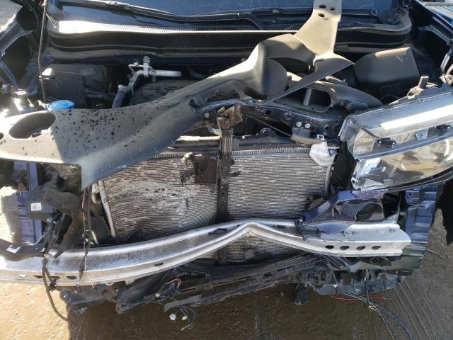 Photo 11 from auction – 2023 HONDA PASSPORT E with VIN 5FNYF8H09PB038438
