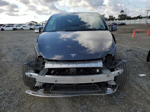 Photo 5 from auction – 2021 TESLA MODEL Y with VIN 5YJYGAEE0MF160069