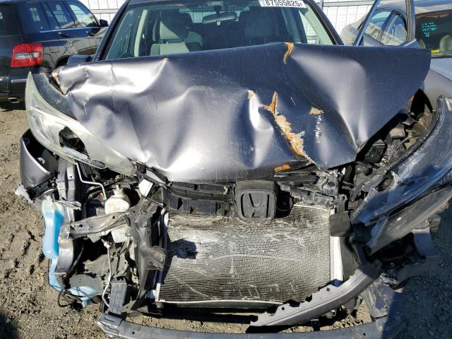 Photo 11 from auction – 2015 HONDA CR-V LX with VIN 3CZRM3H34FG715938
