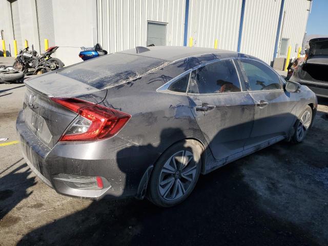 Photo 3 from auction – 2018 HONDA CIVIC EX with VIN JHMFC1F85JX018408