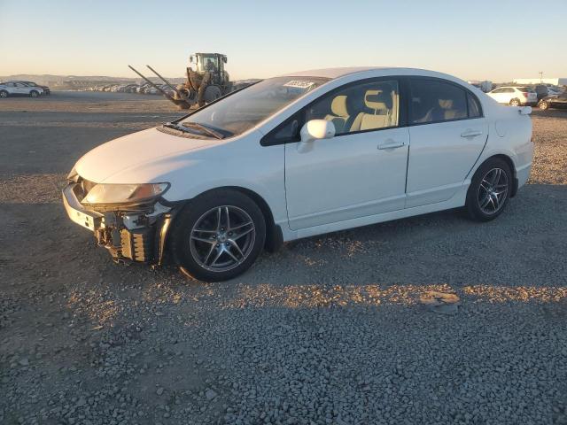 HONDA CIVIC LX 2011 with VIN 2HGFA1F53BH307677 - Photo from auction