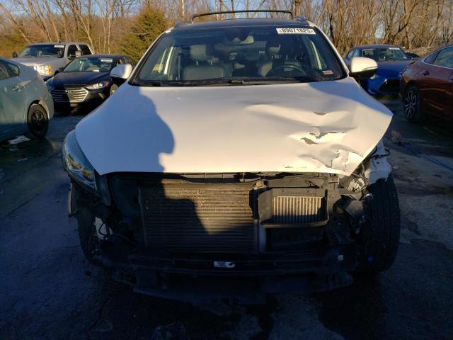 Photo 5 from auction – 2016 KIA SORENTO SX with VIN 5XYPKDA18GG020704