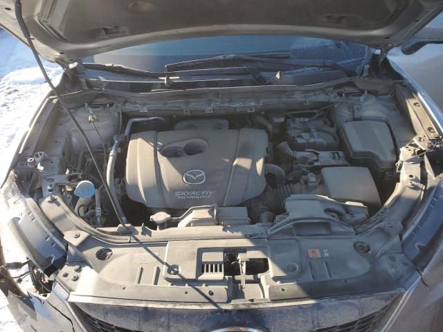 Photo 11 from auction – 2014 MAZDA CX-5 SPORT with VIN JM3KE2BE6E0321974