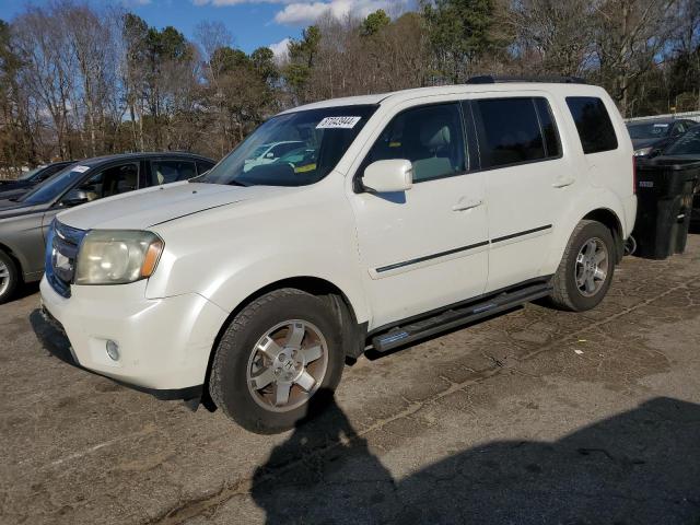HONDA PILOT TOUR 2011 with VIN 5FNYF3H99BB021200 - Photo from auction
