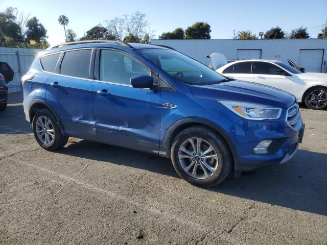 Photo 4 from auction – 2018 FORD ESCAPE SE with VIN 1FMCU0GD3JUD05704