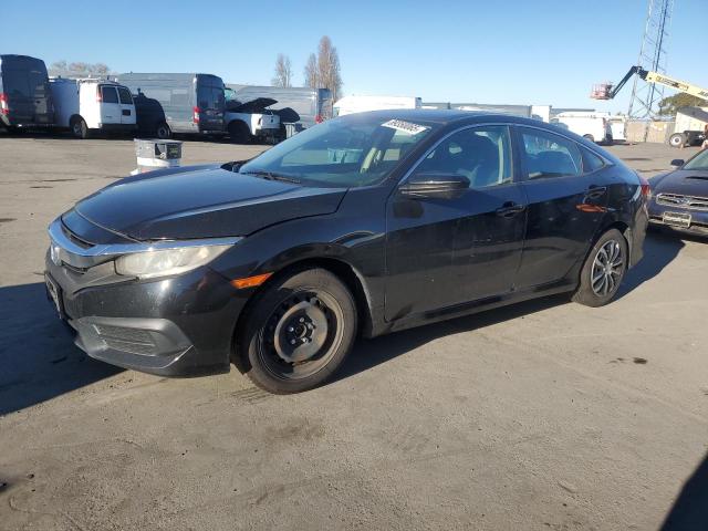 HONDA CIVIC LX 2016 with VIN 19XFC2F53GE200288 - Photo from auction