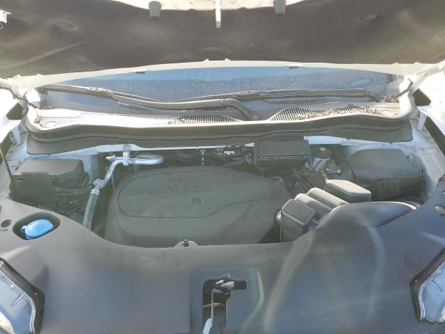Photo 12 from auction – 2021 HONDA PASSPORT E with VIN 5FNYF8H07MB022007