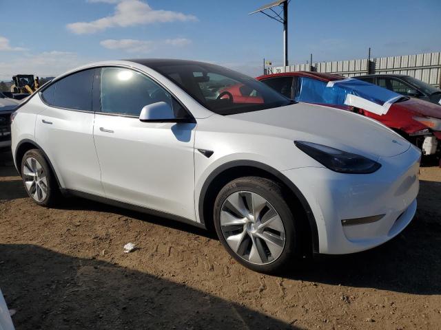 Photo 4 from auction – 2023 TESLA MODEL Y with VIN 7SAYGDEE7PF745272