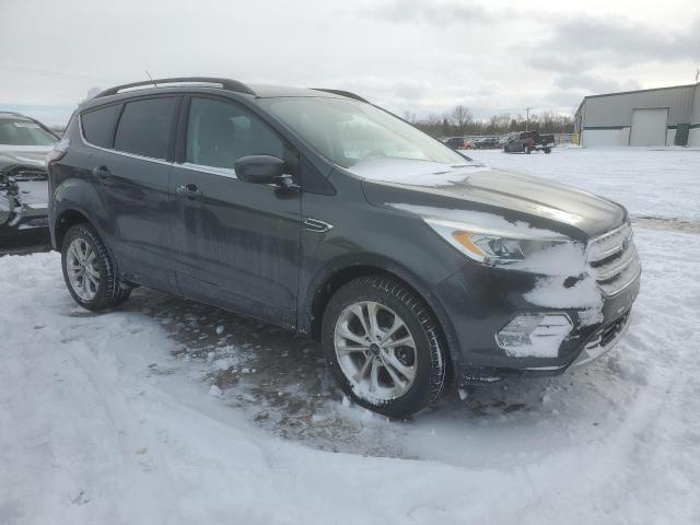 Photo 4 from auction – 2017 FORD ESCAPE SE with VIN 1FMCU9GD7HUC17060