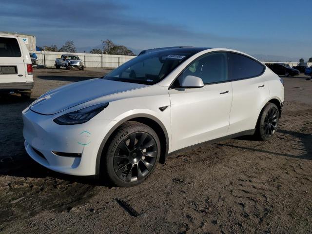TESLA MODEL Y 2021 with VIN 5YJYGAEE2MF297708 - Photo from auction
