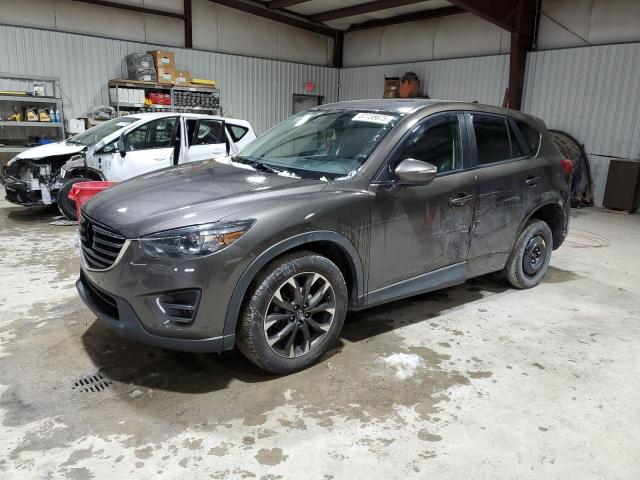 MAZDA CX-5 GT 2016 with VIN JM3KE4DY7G0713349 - Photo from auction