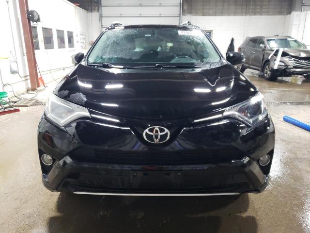 Photo 5 from auction – 2016 TOYOTA RAV4 XLE with VIN 2T3RFREV5GW491878