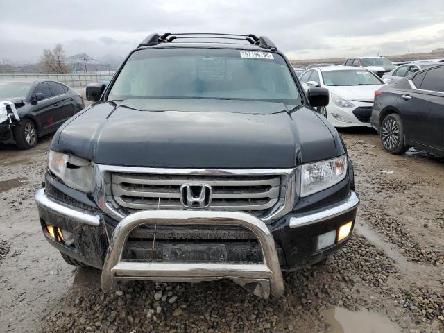Photo 5 from auction – 2014 HONDA RIDGELINE with VIN 5FPYK1F52EB003553