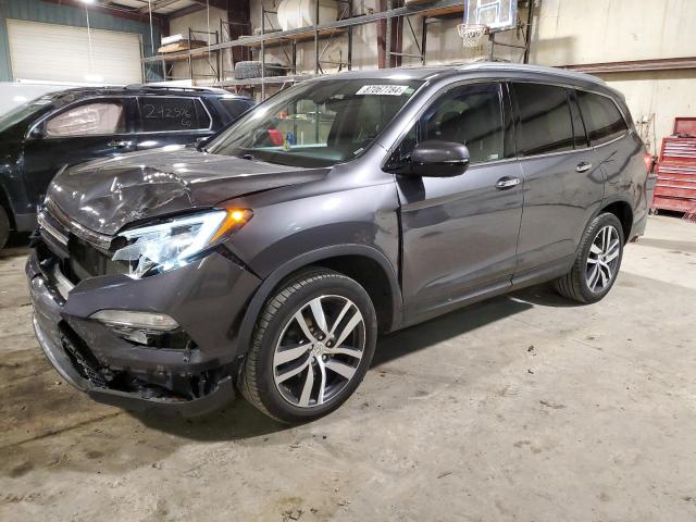 HONDA PILOT ELIT 2017 with VIN 5FNYF6H08HB103706 - Photo from auction