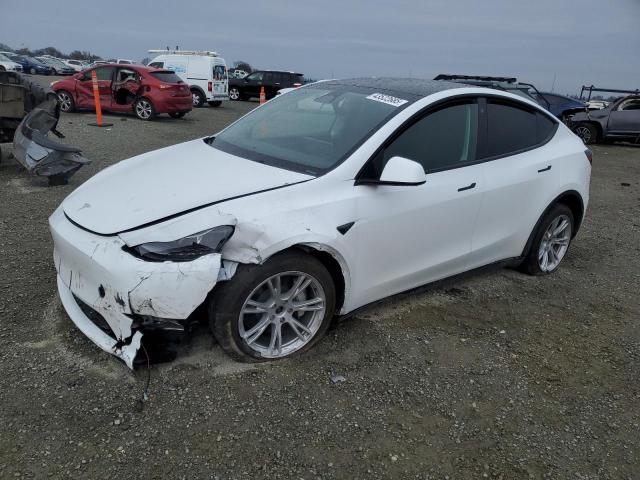 TESLA MODEL Y 2023 with VIN 7SAYGDEE7PF660738 - Photo from auction
