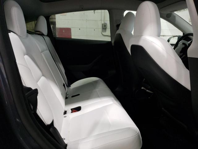 Photo 11 from auction – 2023 TESLA MODEL Y with VIN 7SAYGDEE1PF870610