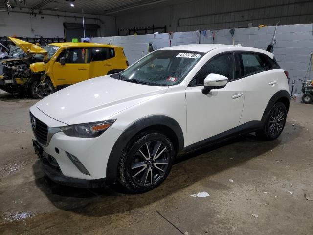 MAZDA CX-3 TOURI 2018 con VIN JM1DKFC78J0308512 - Foto de la subasta
