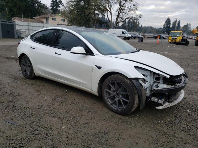 Photo 4 from auction – 2022 TESLA MODEL 3 with VIN 5YJ3E1EB7NF334565