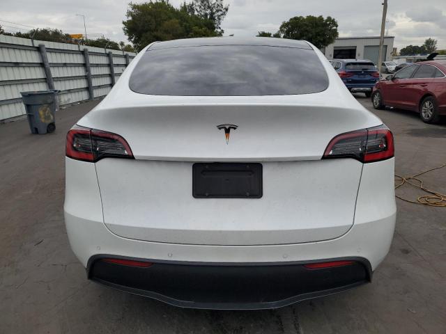 Photo 6 from auction – 2021 TESLA MODEL Y with VIN 5YJYGDED7MF116398
