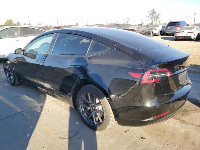 Photo 2 from auction – 2021 TESLA MODEL 3 with VIN 5YJ3E1EA5MF082272