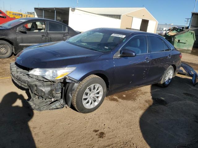 TOYOTA CAMRY LE 2017 with VIN 4T1BF1FK7HU693090 - Photo from auction