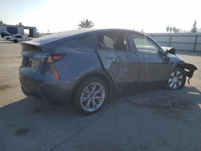Снимка 3 от търг – 2023 TESLA MODEL Y с VIN 7SAYGDEE8PF855764