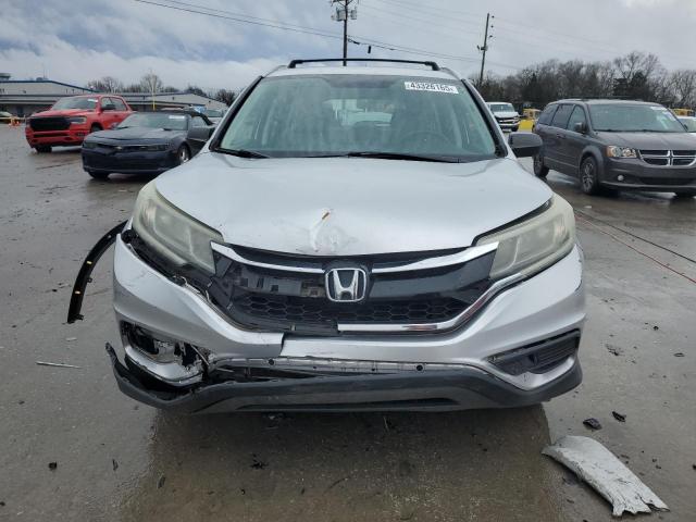 Photo 5 from auction – 2015 HONDA CR-V LX with VIN 2HKRM3H34FH506325