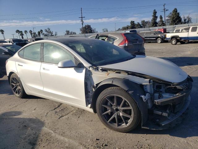 Photo 4 from auction – 2021 TESLA MODEL 3 with VIN 5YJ3E1EA4MF976215